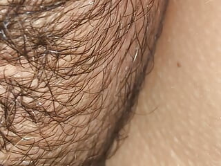 Tonguing the spit from my wife's furry vag in slow mobility and macro shot you can observe the spit dribbling from deep inwards her vag