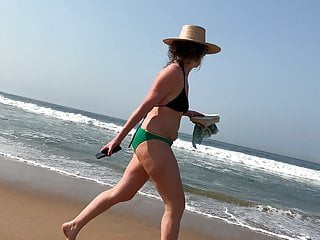 Beach woman arse . Juggling