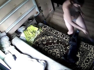 Scorching cougar chilling on her sofa revealed to ip camera
