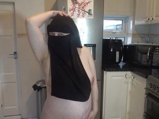 Dancing entirely naked in Niqab