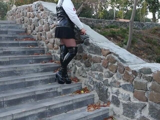 Domina Natalie In High-heeled dark-hued Patent-leather shoes Outside In The Park